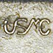 [USMC-Script Logo]