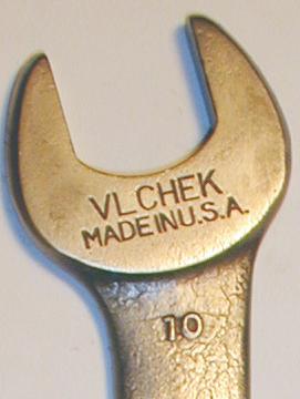 [Vlchek Logo on Open-End Wrench]